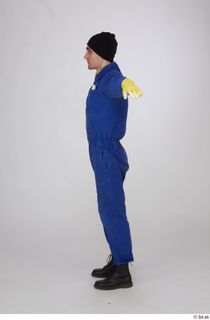 Photos Shawn Jacobs Painter in Blue Coveralls standing t poses…